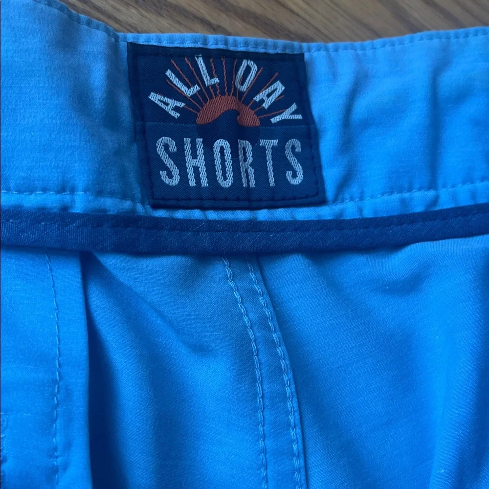 Faherty All Day Shorts, light blue size 33, button, zipper and drawstring.